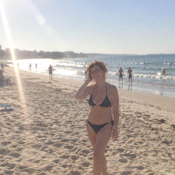 Cliente sur la plage après sa cure